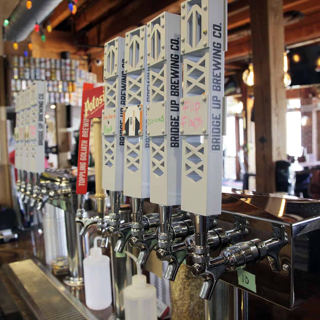 Tap beer handles Bridge Up Brewing craft beer brewery and taprooms in Door County Wisconsin