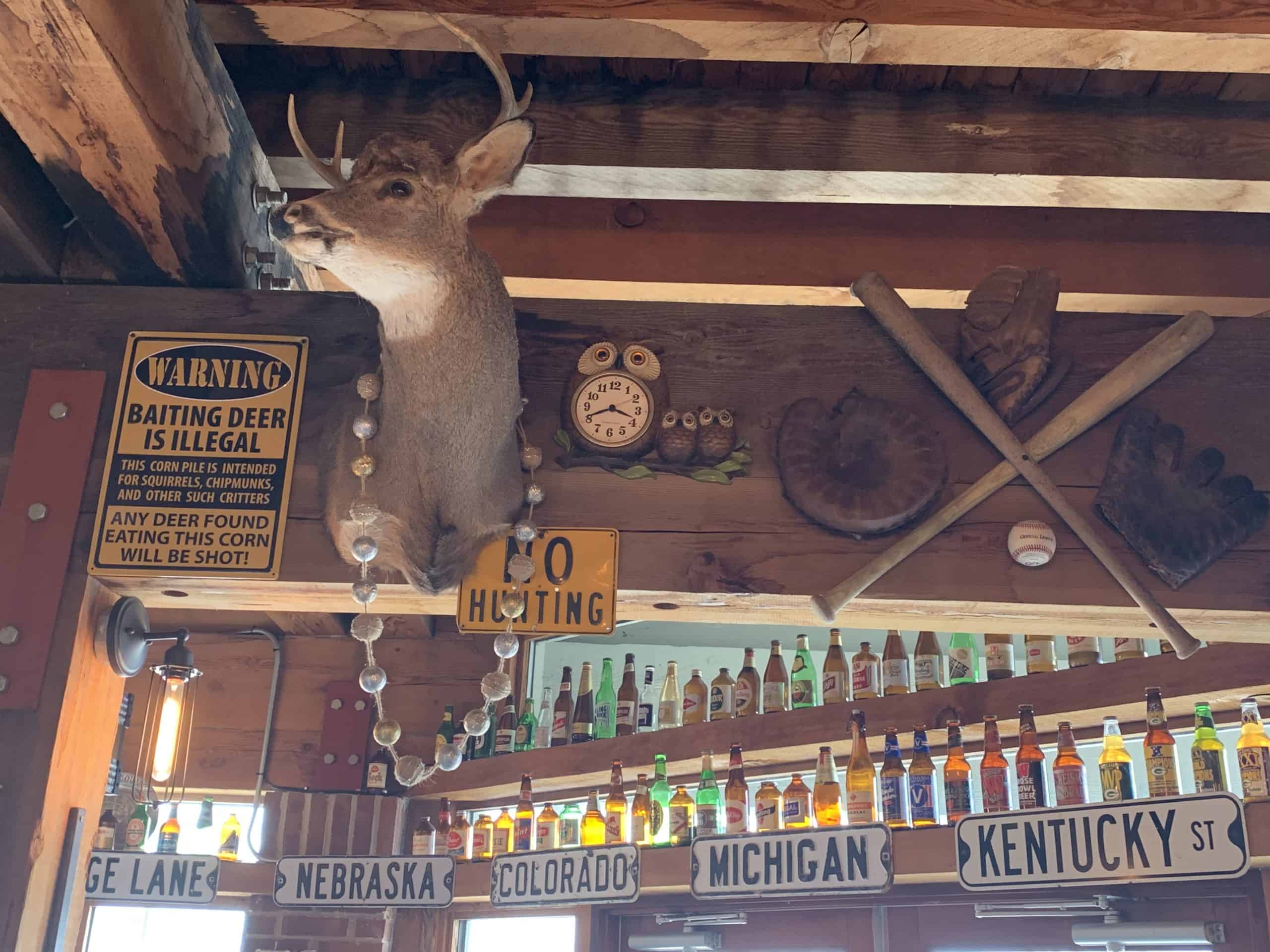 Vintage beer bottles and can collection at Bridge Up Brewing craft beer brewery and taprooms in Door County Wisconsin