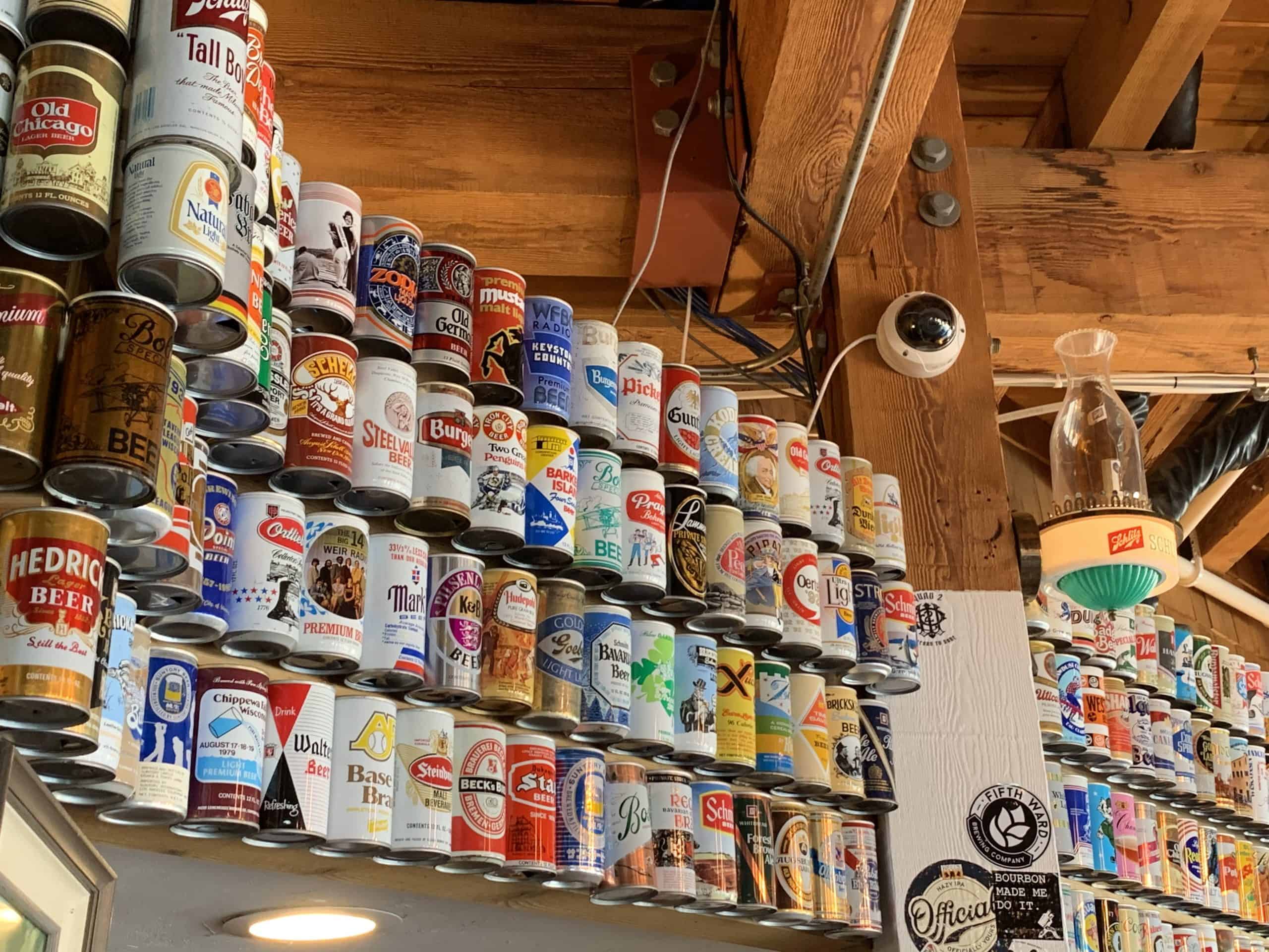 Vintage beer bottles and can collection at Bridge Up Brewing craft beer brewery and taprooms in Door County Wisconsin