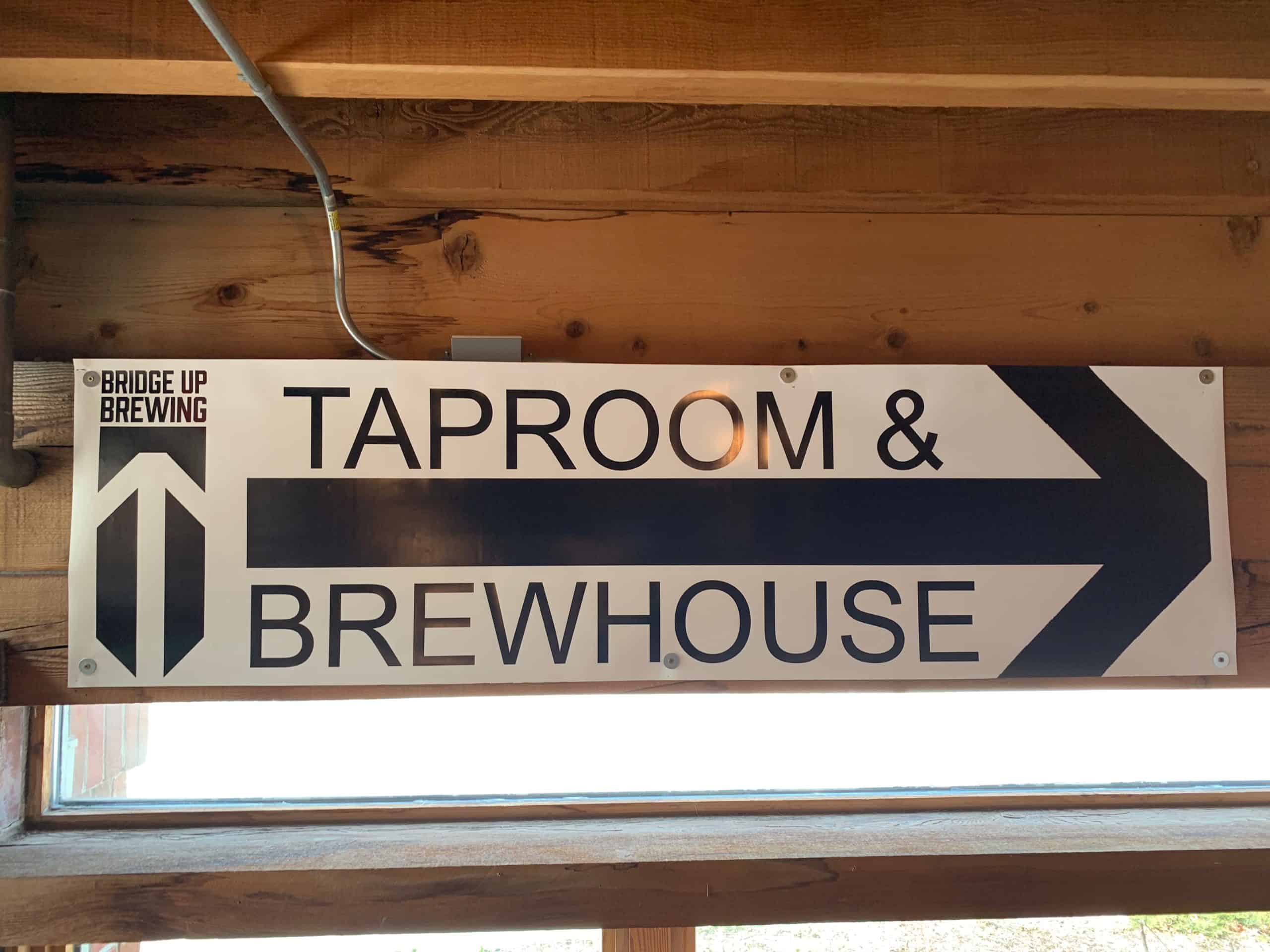 Taproom and brewhouse sign at Bridge Up Brewing craft beer brewery and taprooms in Door County Wisconsin