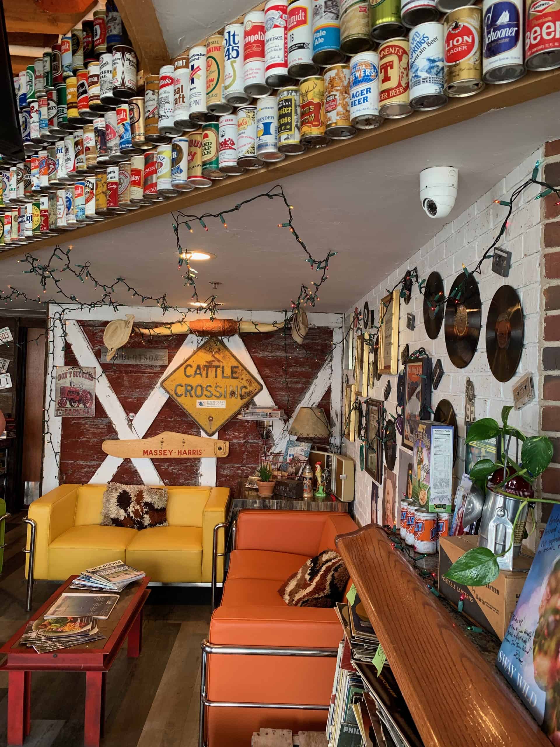 Beer can and vintage vinyl records collection at Bridge Up Brewing craft beer brewery and taprooms in Door County Wisconsin